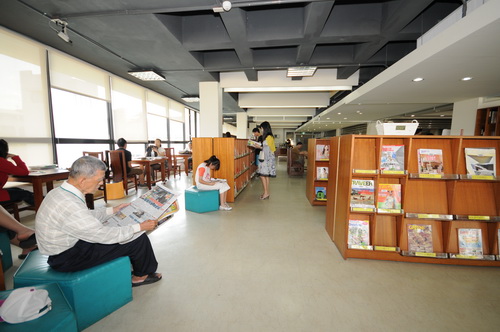 Visitors reading books